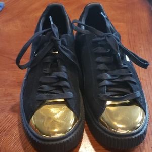Puma Gold & Black Platform Suede Sneakers